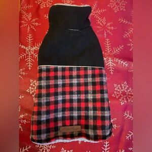 Eddie Bauer dog coat in red/black plaid. Has Velcro belly and neck closures